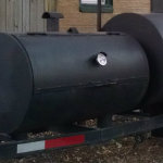 black bbq pit with cover