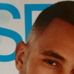 photo of a cover of Essence Magazine featuring the face of a black young man